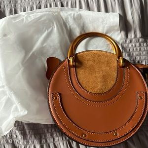 Round leather handbag